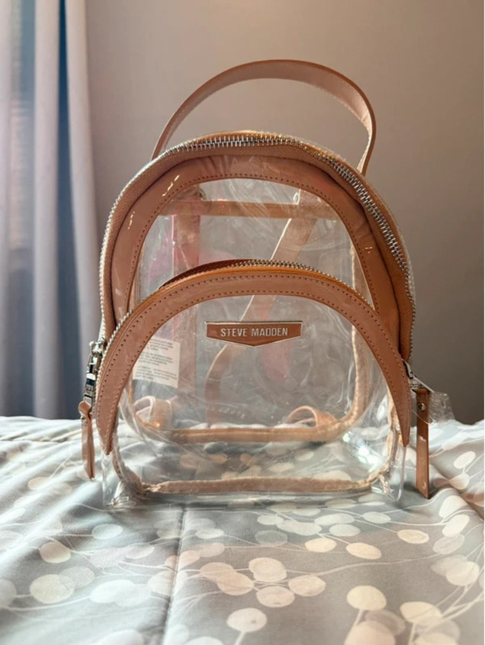 Steve Madden clear backpack with tan accents and matching pouch